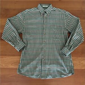 Orvis size medium, long sleeve button down collar shirt with pocket.